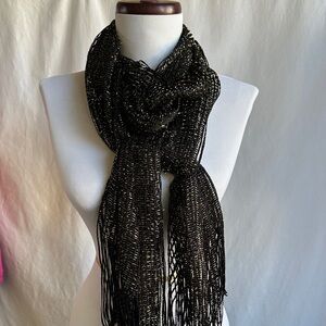 Elegant black and gold metallic oblong semi-sheer scarf with fringe, 70” x 27”